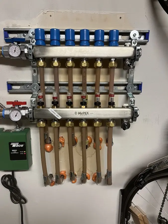 Plumber performing Leak Detection at a residential property in DeWitt